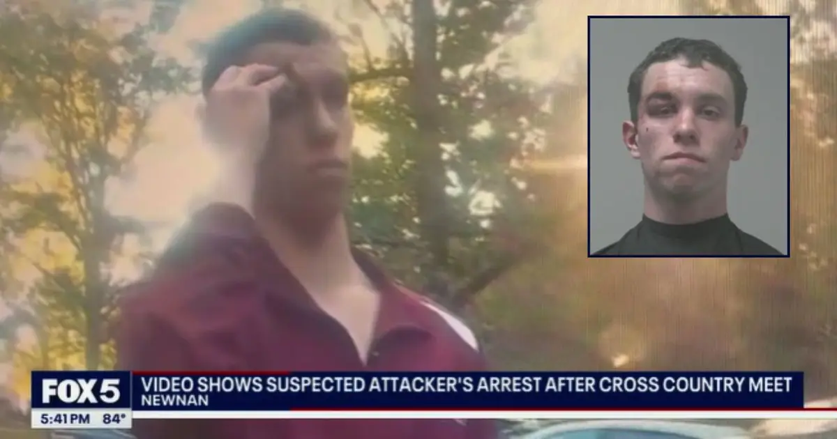 High school cross-country runner attacked during race by man disguised in opponent's jersey who appeared from the woods, then escaped back into the trees: Cops