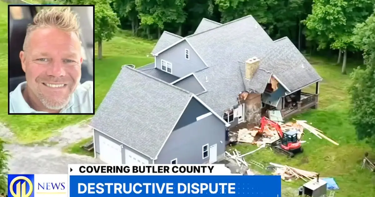 'If it's over, I'll tear the house down': Man returning home to his wife saying she's 'done' begins demolishing house with excavator as his family is inside, c…