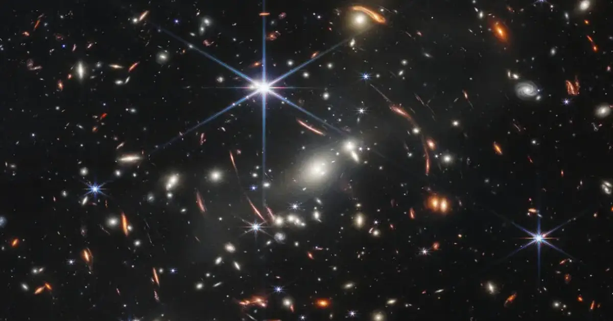 Gravitational lens shows a galaxy just 800 million years post-Big Bang