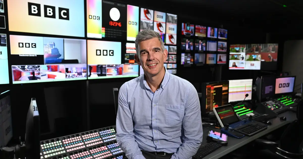 BBC Staff In Town Hall Revolt Over 1% Pay Rise, Job Cuts & Romesh Ranganathan Ad: “It’s Insulting”