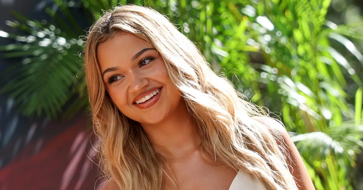 ‘Outer Banks’ Star Madison Bailey On Show’s “Lack Of Queer Representation,” Desire To Play LGBTQ Role: “I’ve Been Manifesting It”