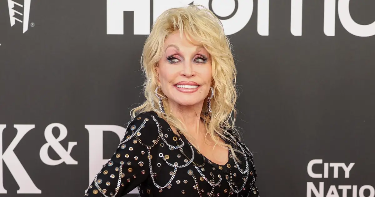 Dolly Parton Misses Dollywood Ride Opening Amid Ongoing “Health Issues”: “See You Down The Road”
