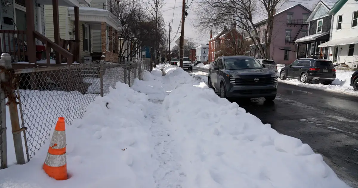 Cincinnati considering review of sidewalk snow removal enforcement after storm