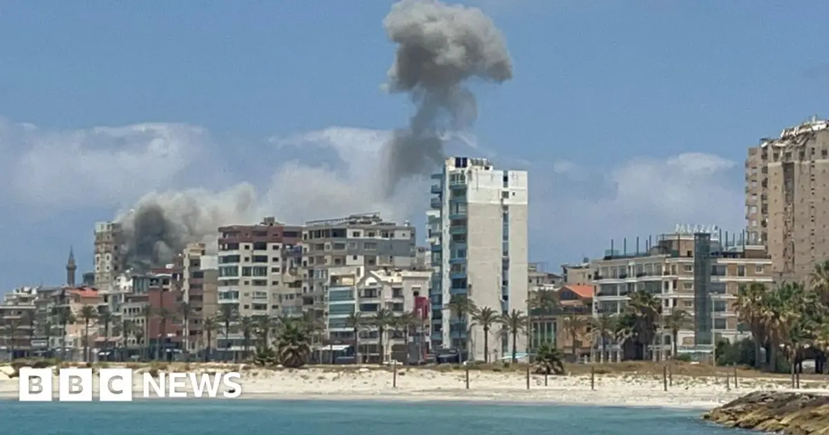 Israeli air strikes hit Lebanese city of Tyre despite Iranian warning to stop attacks
