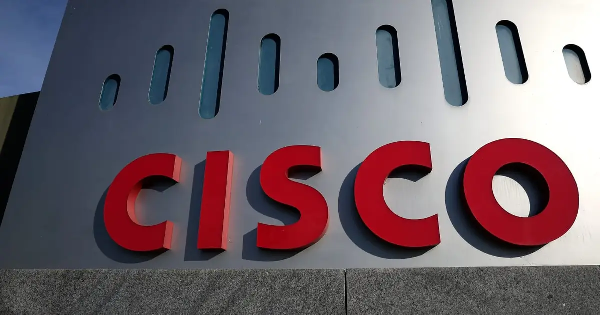 Cisco to cut jobs so it can invest more in AI, and the stock rockets toward a record