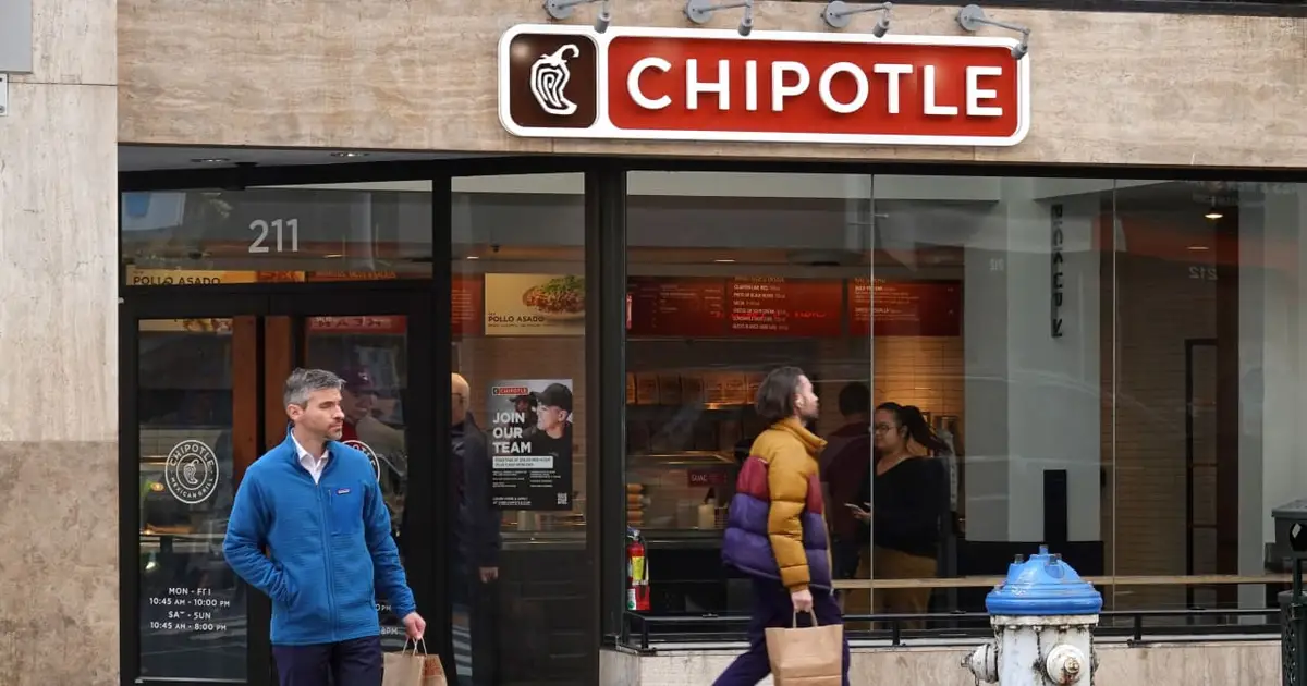 Chipotle lifts its sales forecast even as a lettuce-linked outbreak slows foot traffic