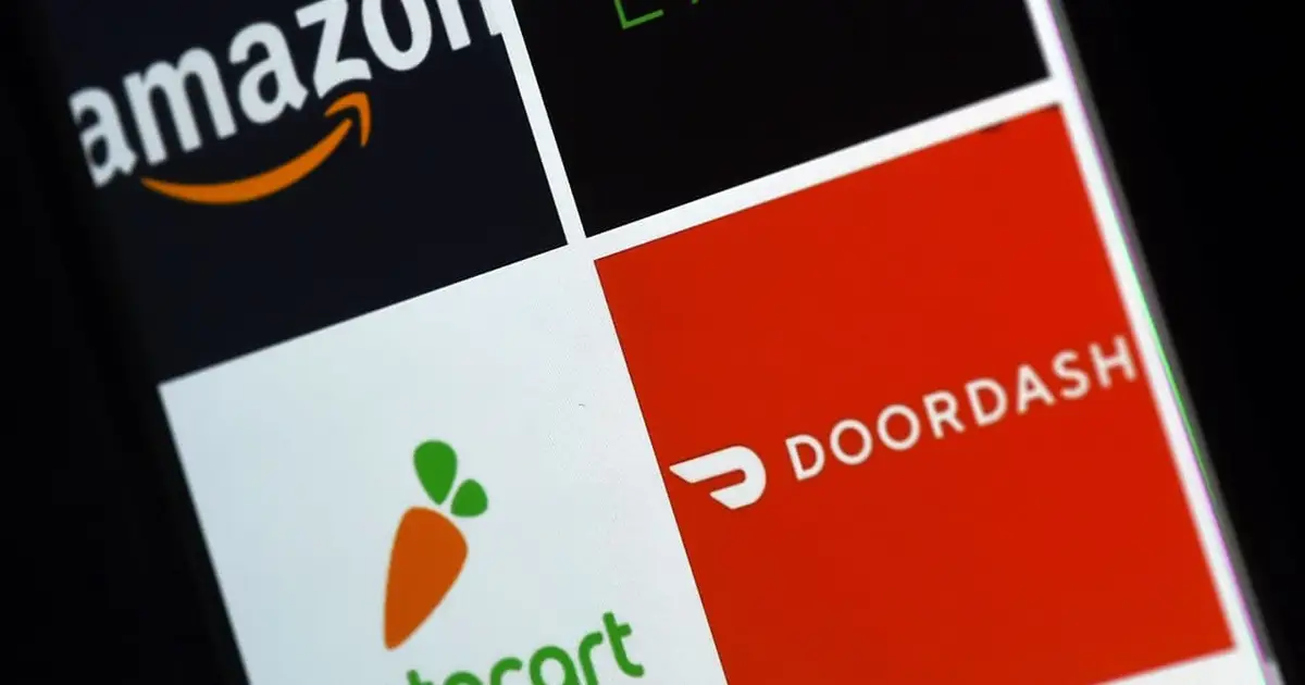 A possible DoorDash-Instacart deal is all about keeping up with Walmart and Amazon, analysts say