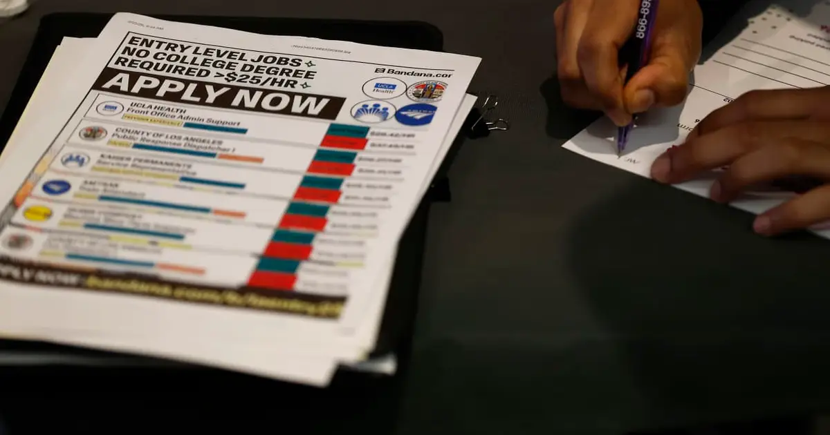 Layoffs fall to the lowest level since the U.S. put men on the moon. Here’s what that says about the economy.