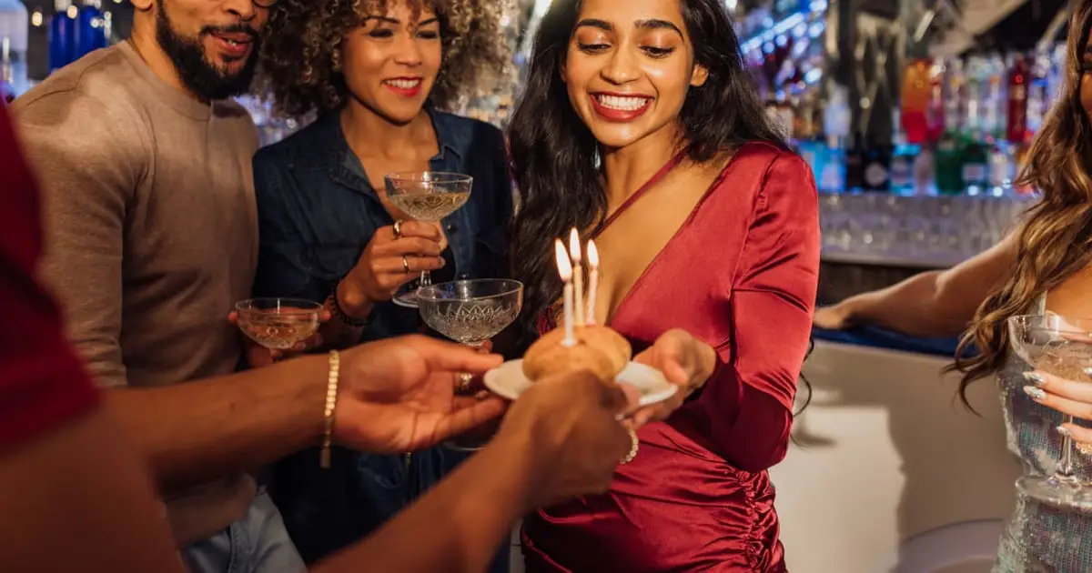 My friend is charging everyone $80 to attend her 30th birthday party. She says it’s to cover the open bar. Is it rude to not go?