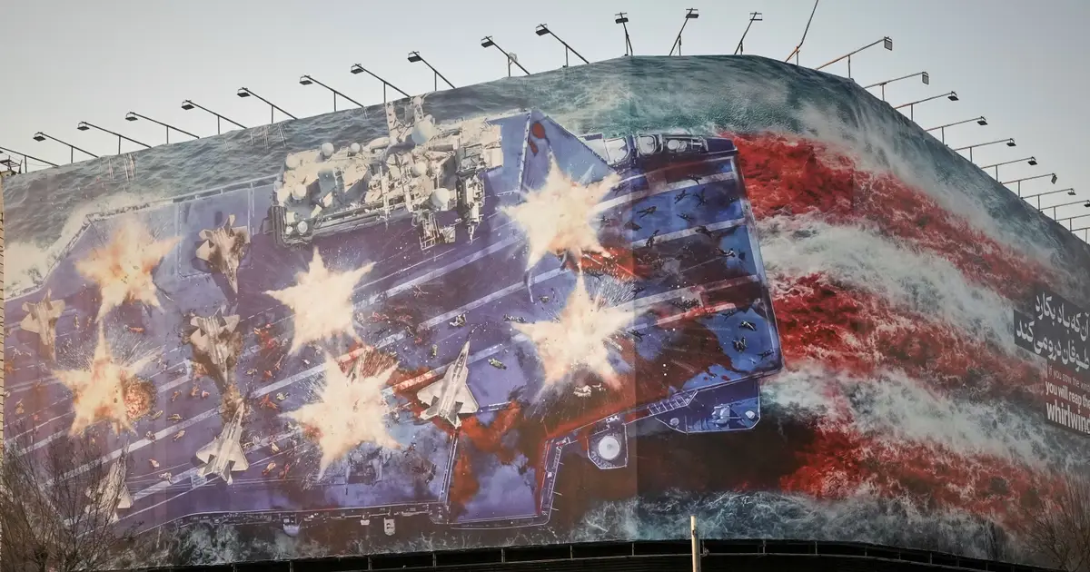 Iran unveils mural warning of retaliation if US conducts a military strike
