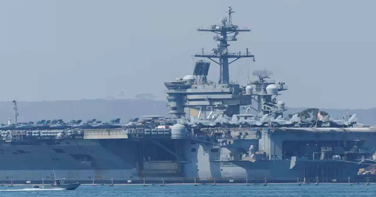 US aircraft carrier enters Middle East region , officials say