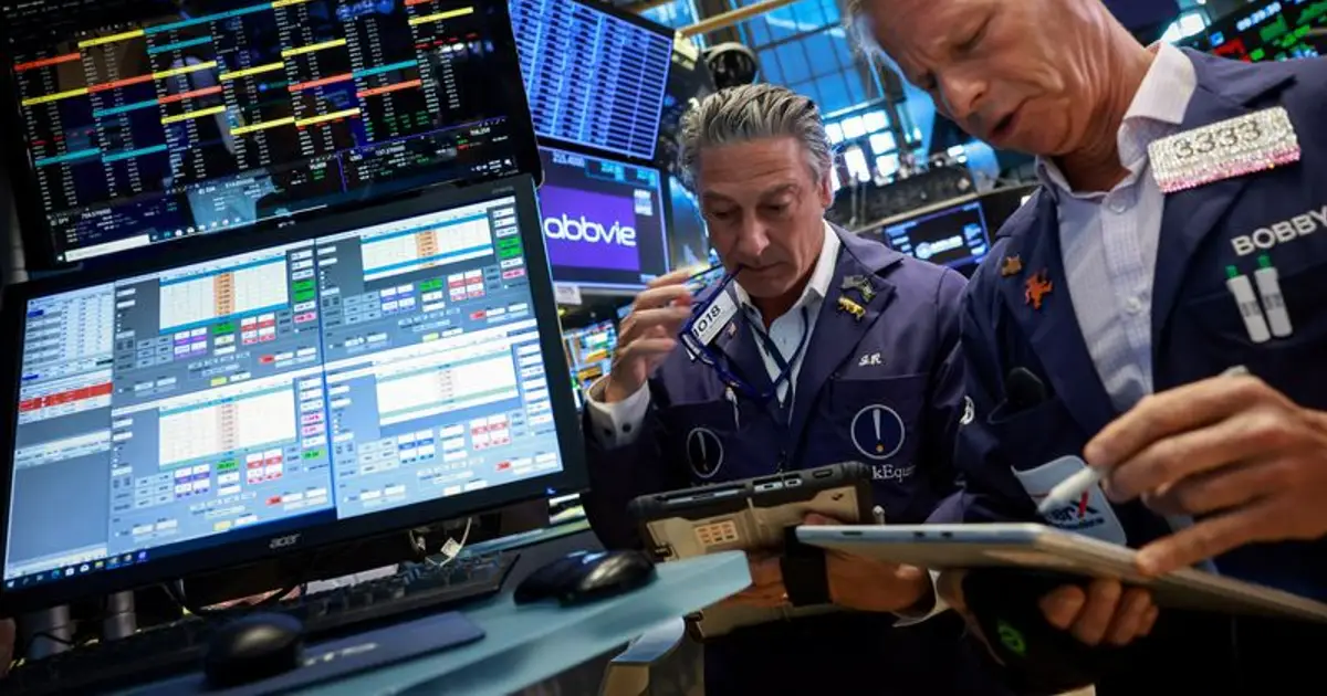 Wall Street ends sharply lower as chips slide, jobs data fuels rate hike fears