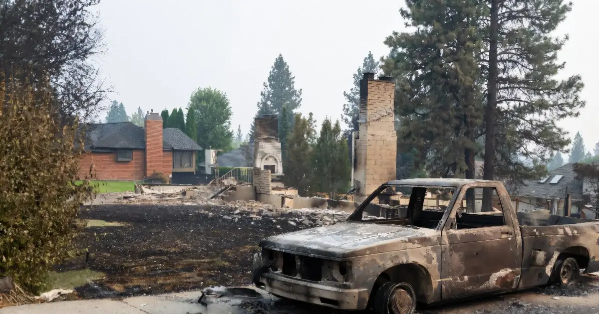 US Northwest battles wildfires after Spokane neighborhoods scorched