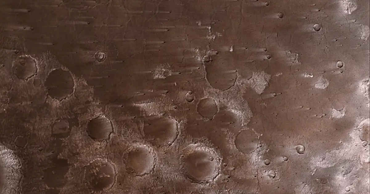 Image: NASA's Psyche mission spies Mars' wind-blown craters during close approach