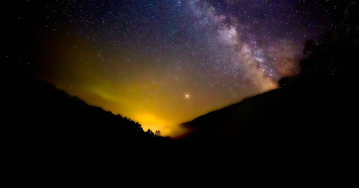 Farmers in a national park are turning down lights at night to help wildlife. It could be good for crops too