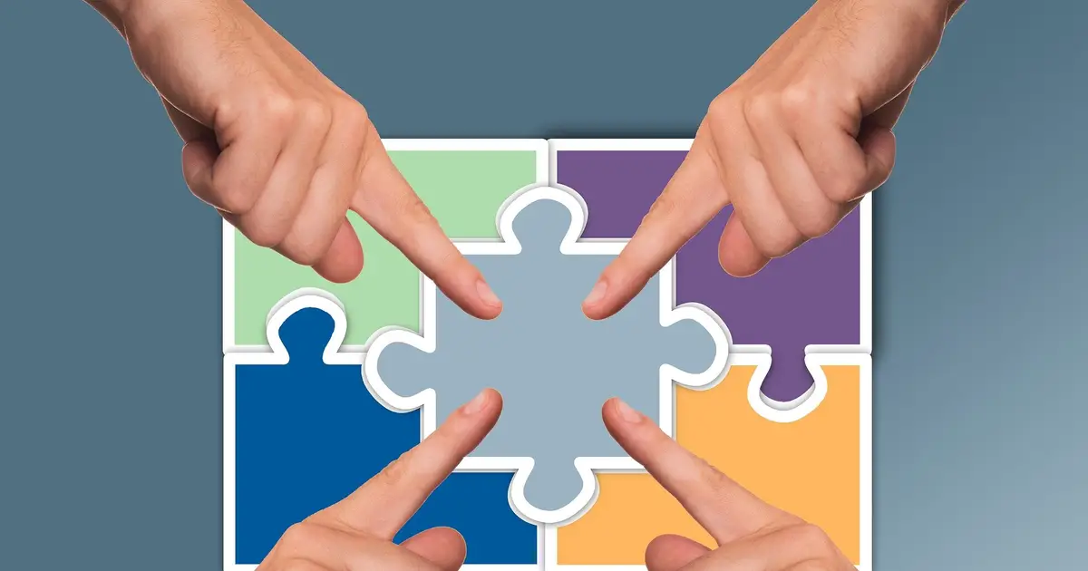 Compromise drives shared risky decisions, but biased blame and credit can break teamwork