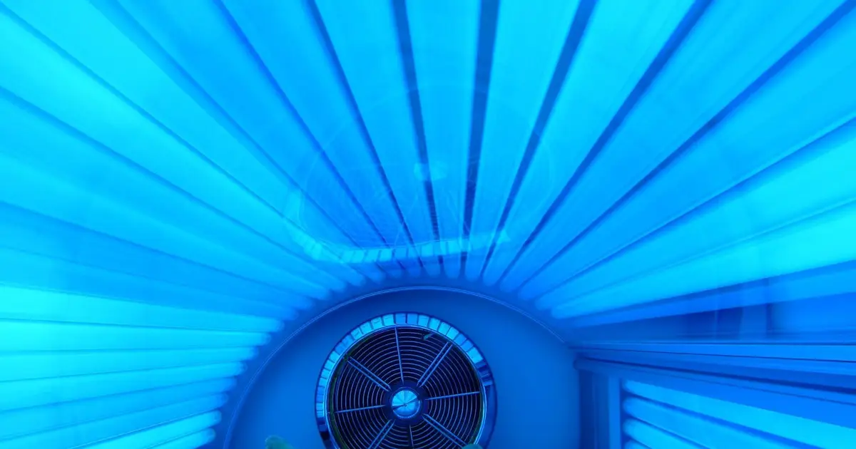 Tanning beds linked to severe skin reactions beyond cancer risk, review finds