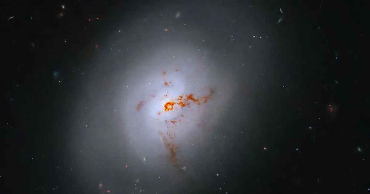 Hubble reveals rare galaxy 100 million light-years away caught in transition