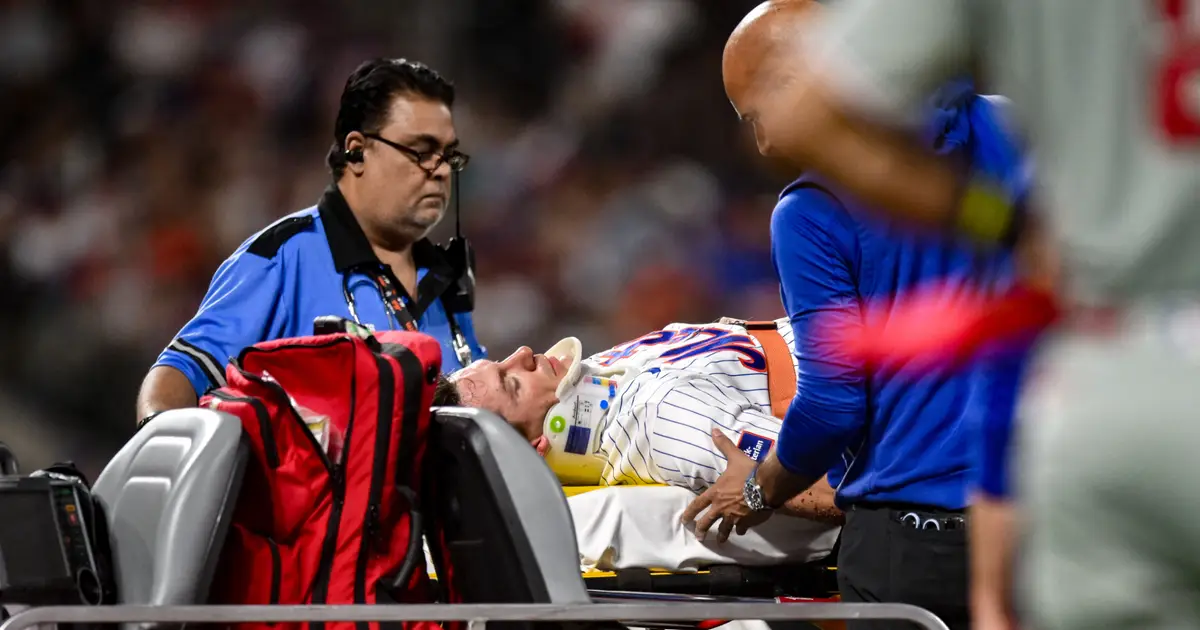 Mets' Jared Young carted off field after colliding with Nolan McLean during play at first base