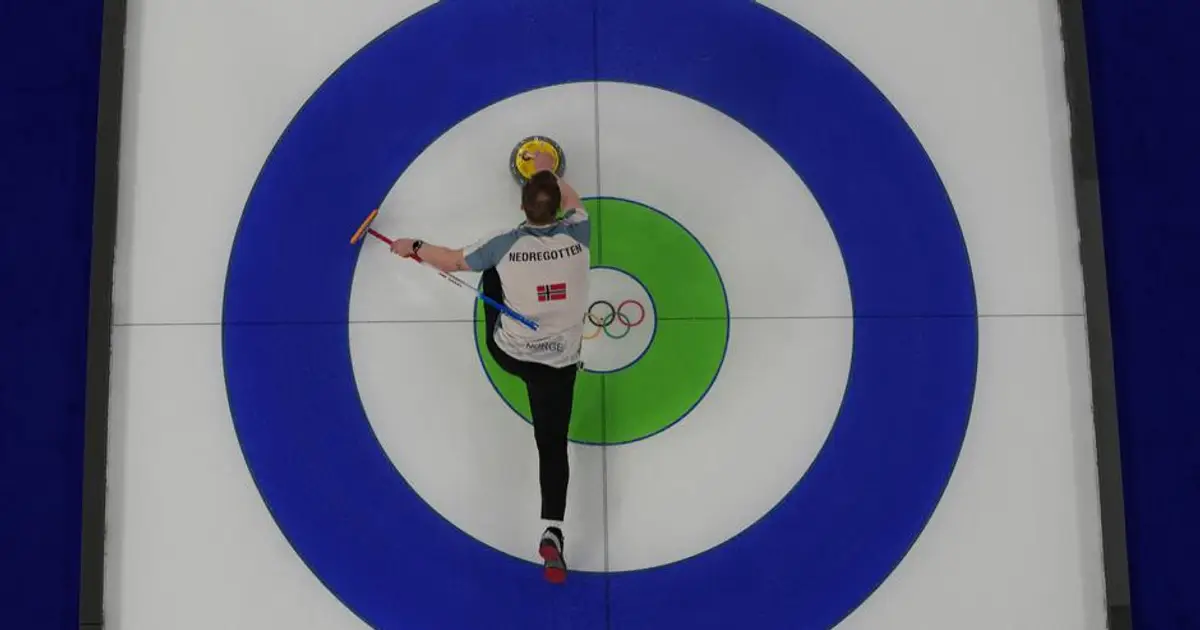 Winter Olympics begin quietly with curling