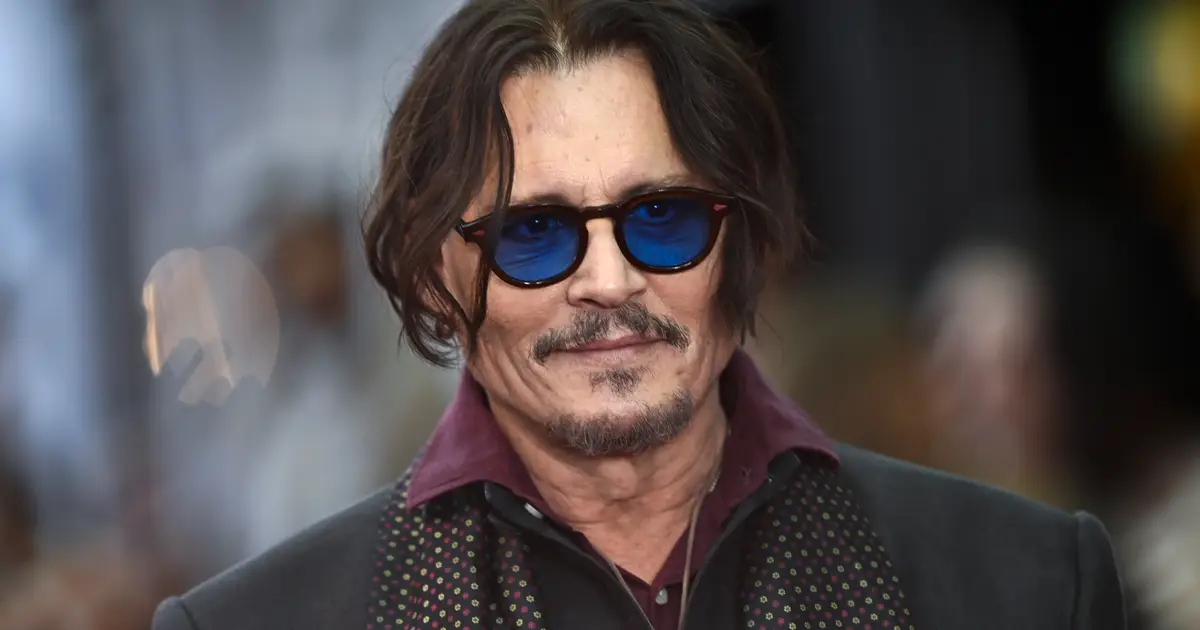 Johnny Depp Makes Surprise Comic-Con Appearance as Ebenezer Scrooge