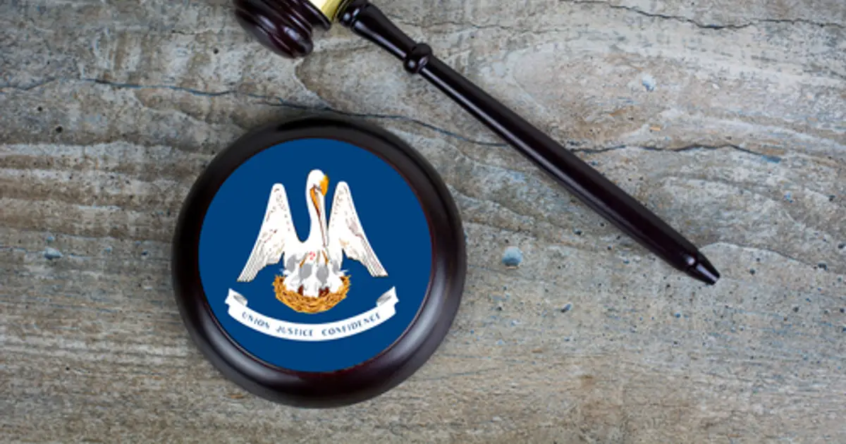 Attorney arrested for bringing gun and drugs onto prison premises