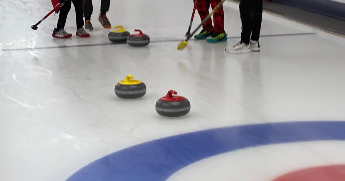 Olympic athletes bring gold medals , coach curling on the ice , at tour in Northbrook