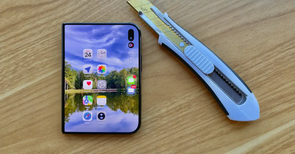 Man Destroys $2,000 iPhone Duo With Dirt, Fire, Knives and Medieval Chainmail