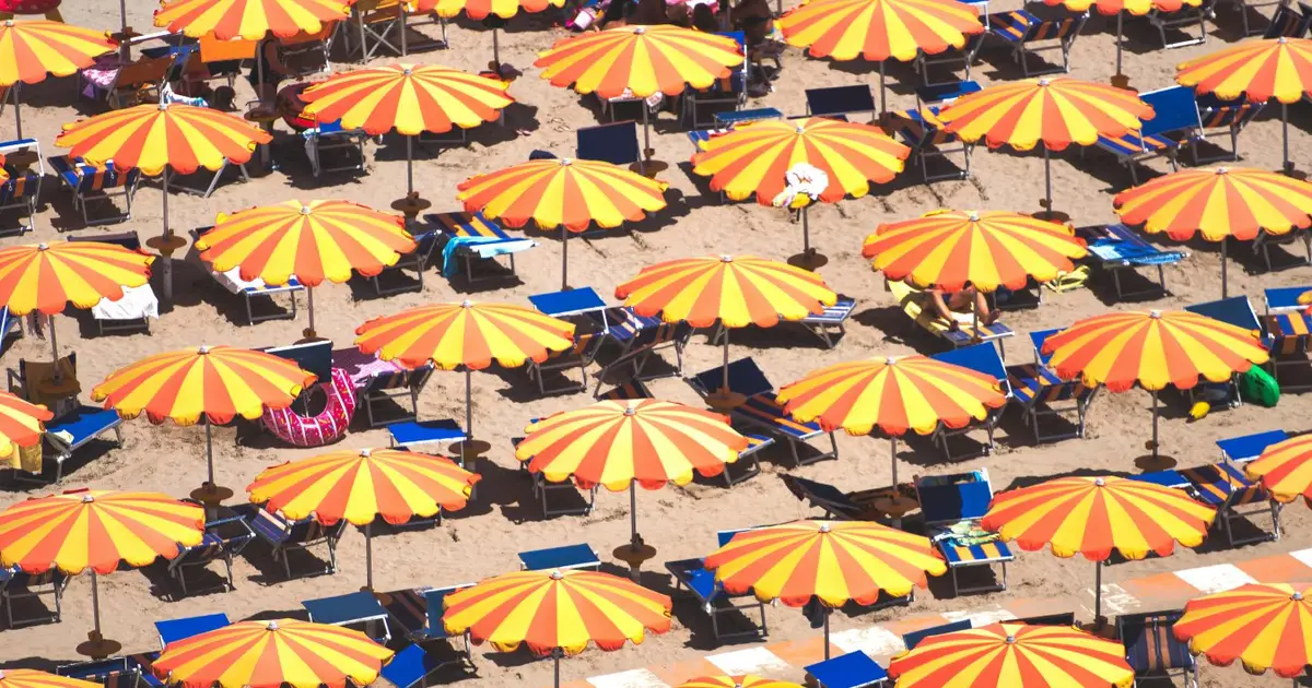 Why sitting under a parasol is barely cooler than being in the sun