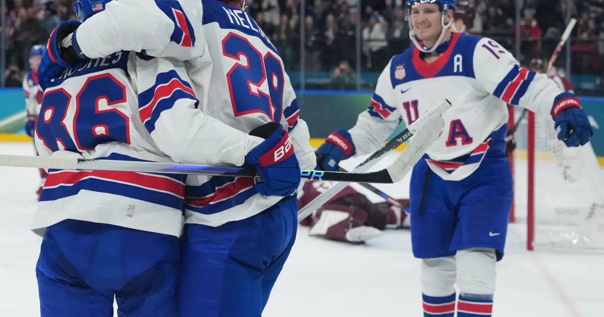 Brock Nelson scores twice as U . S . opens the Olympics by rolling over Latvia 5 - 1